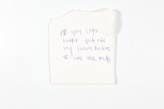 You cops better get off my lawn napkin note by Mikey Larson